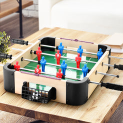 a wooden table with a foosball set up on it